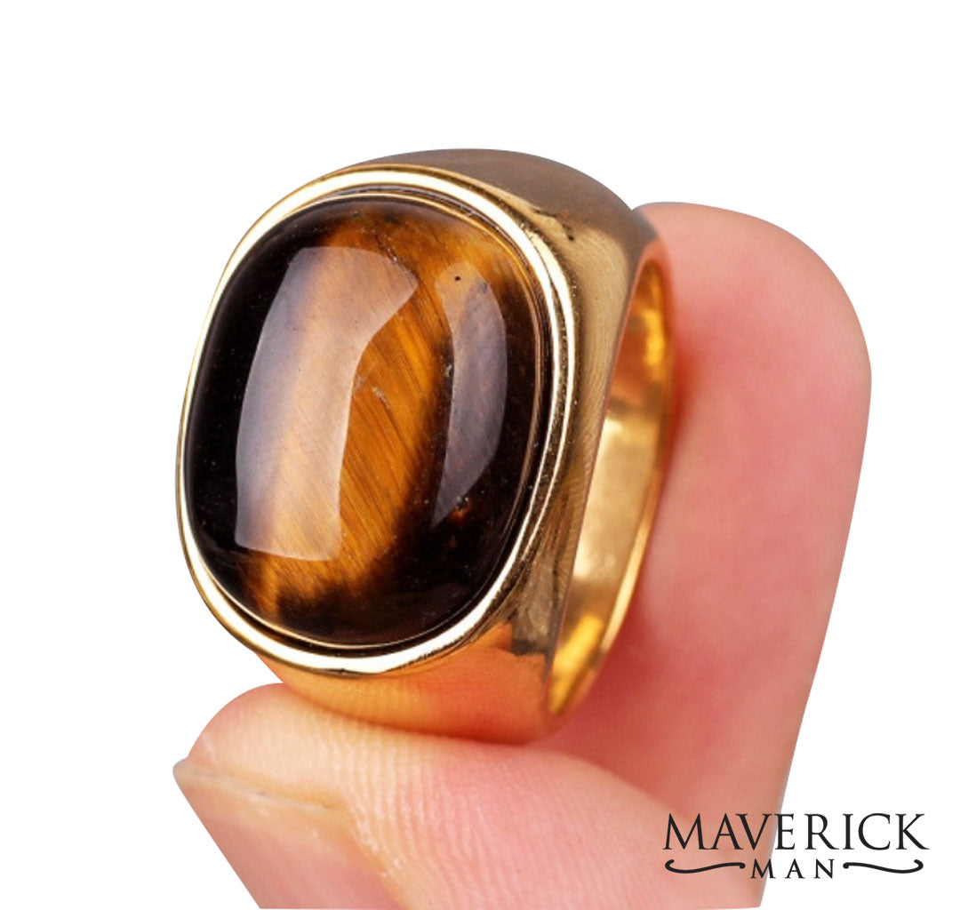 Eye-catching tainless steel ring with tiger eye looking wood stone