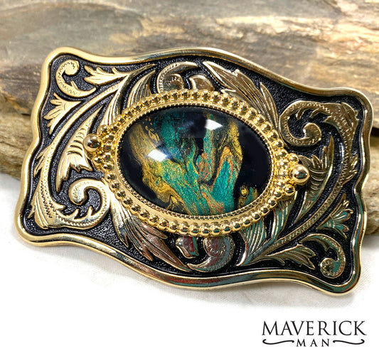 Gold and black filigree buckle with green earthtones hand painted stone
