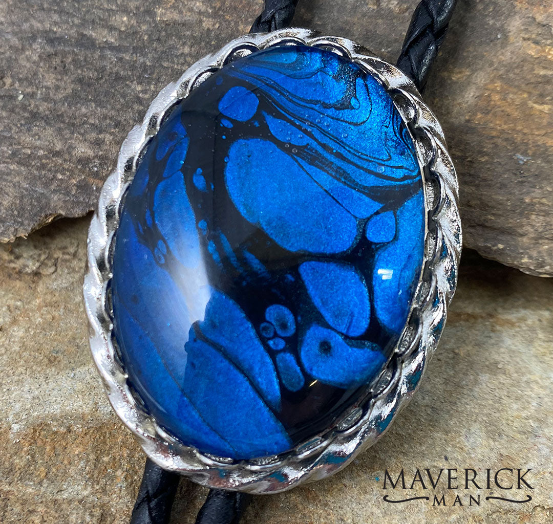 Blue indigo hand painted stone in our large silver bolo