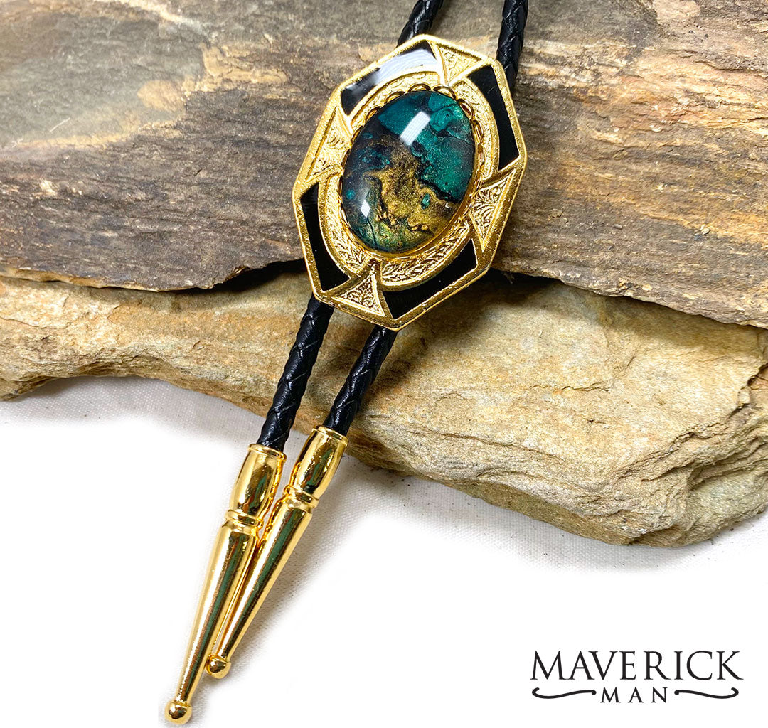 Gold and black dressy geometric bolo with green stone