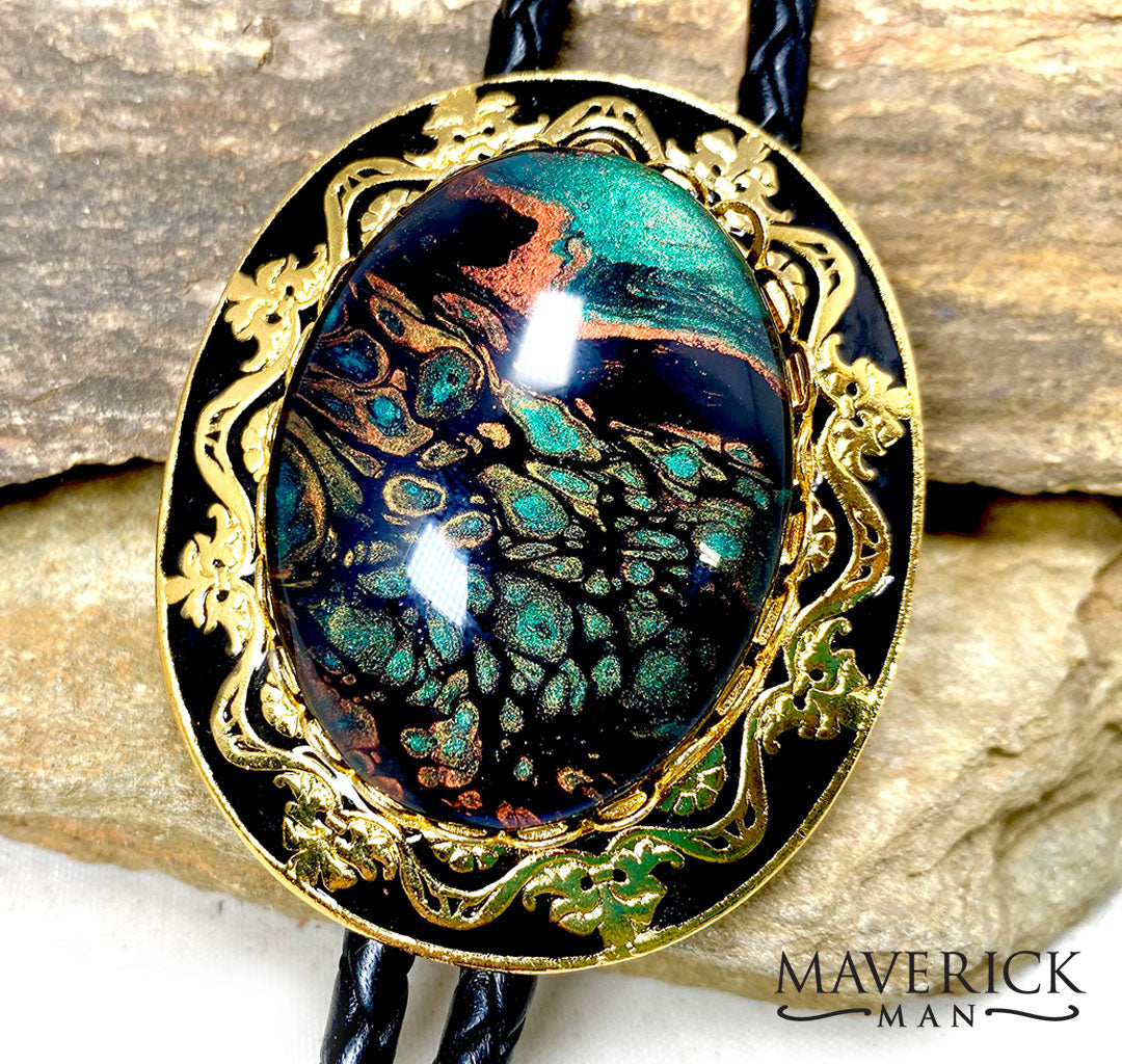Large dressy gold and black bolo with green stone