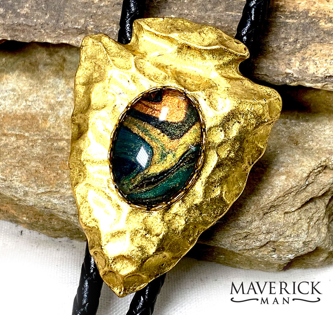Hammered gold arrowhead bolo with green earthtones