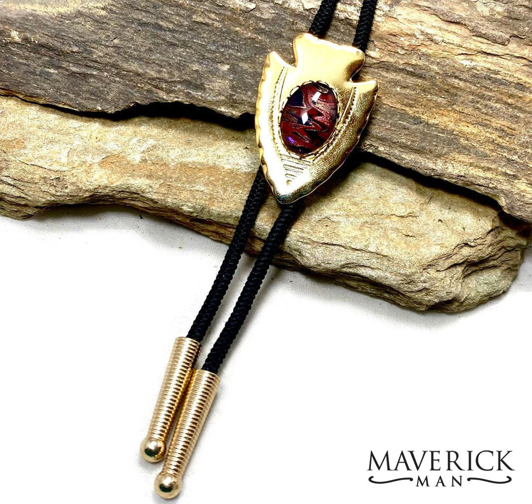 Small golden arrowhead bolo with red gold and black hand painted stone