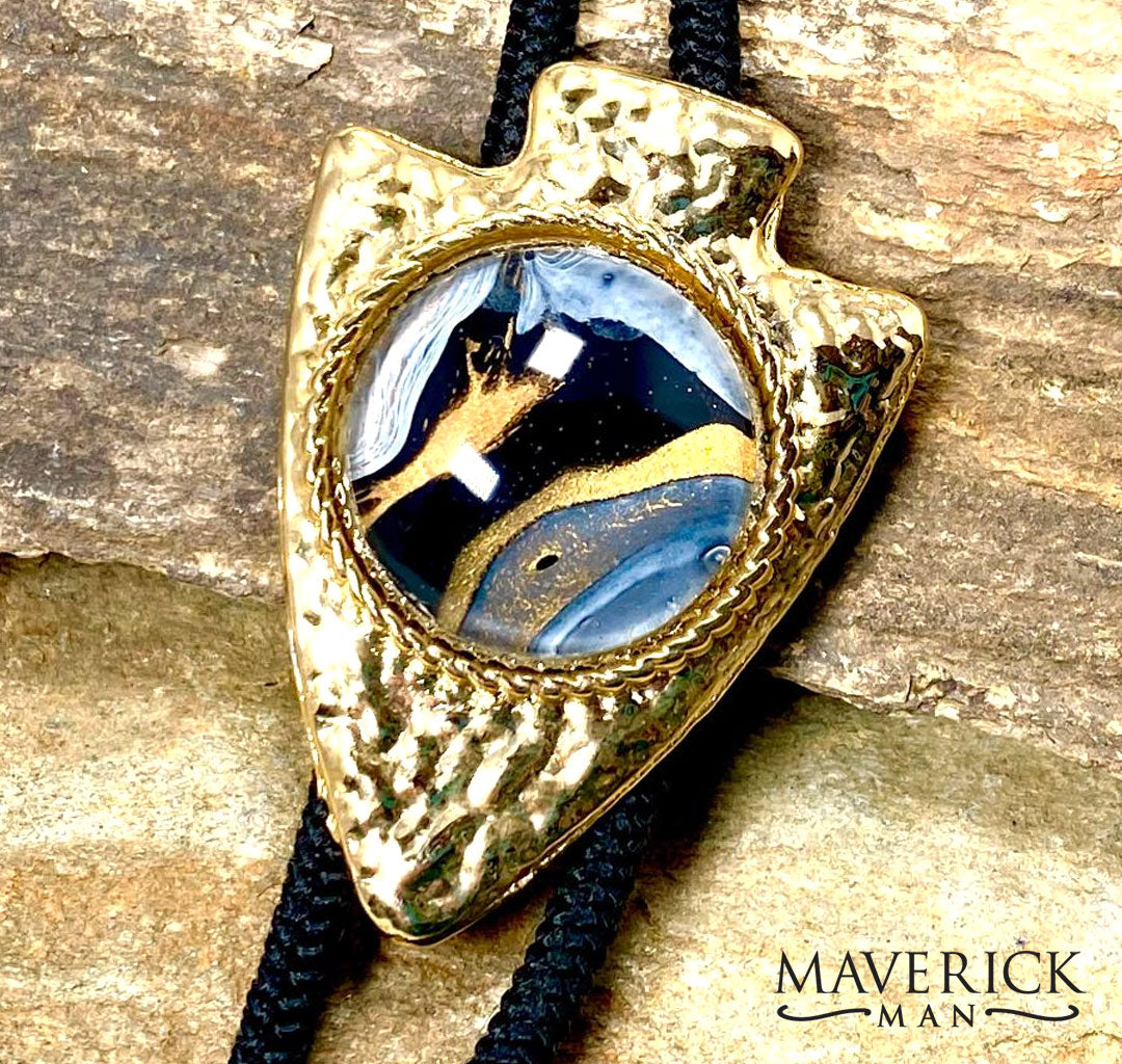 Golden, hammered arrowhead bolo with gold and black hand painted stone