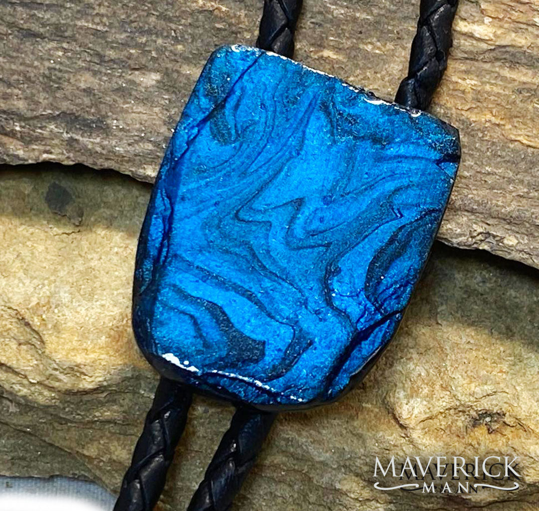 Handsome bolo made from slate with blue and black hand painted stone