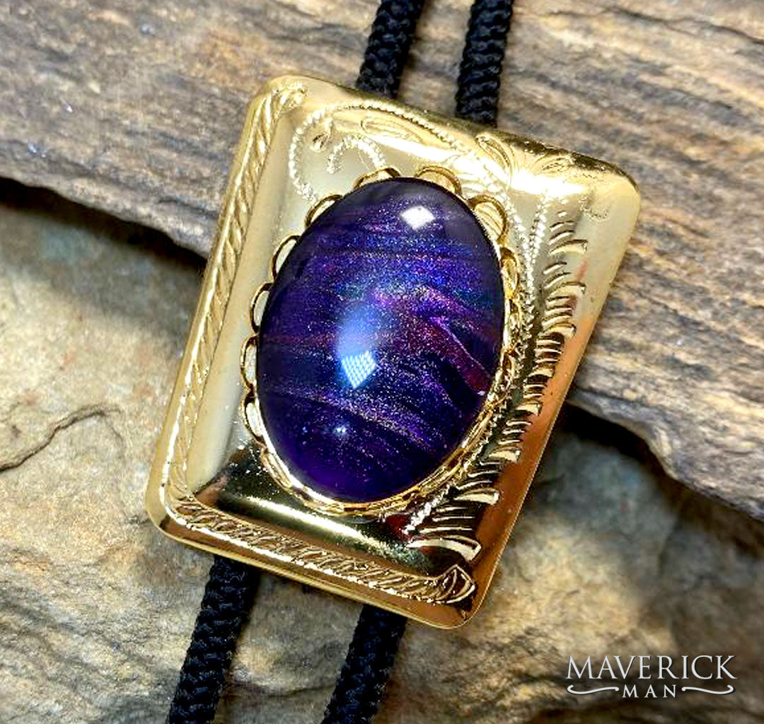 Gold bolo with purple and gold hand painted stone