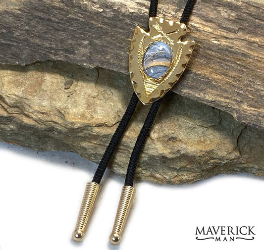 Golden arrowhead bolo with hand painted stone with platinum accents