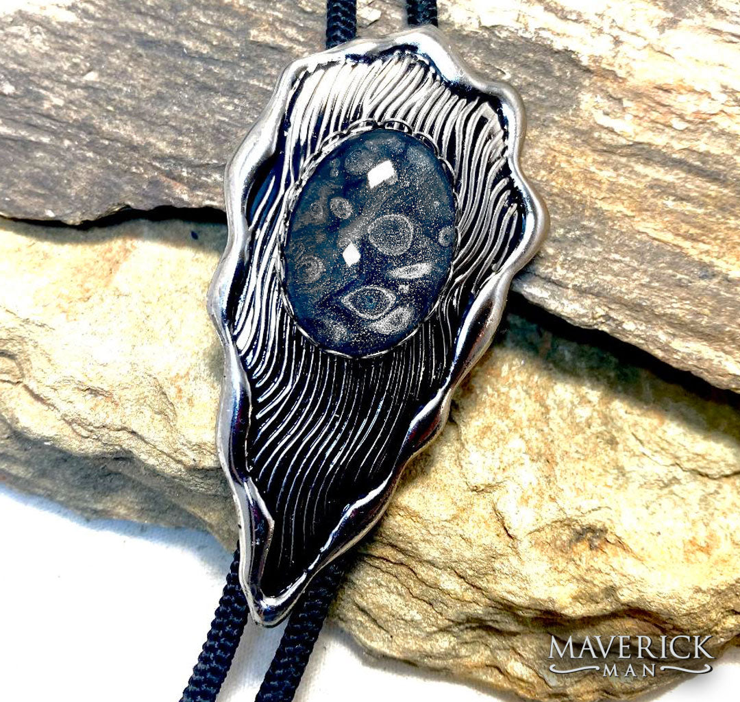 Top-selling black and platinum hand painted stone in our modern feather bolo