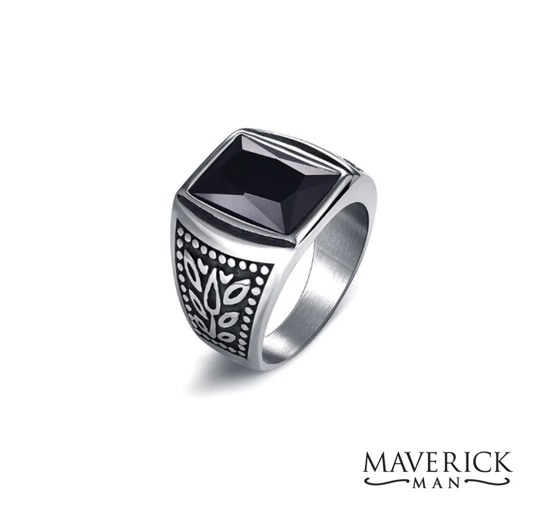 Handsome titanium ring with faceted black onyx