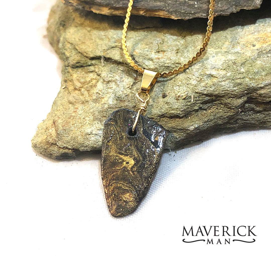 Small gold and black slate pendant with gold stainless chain