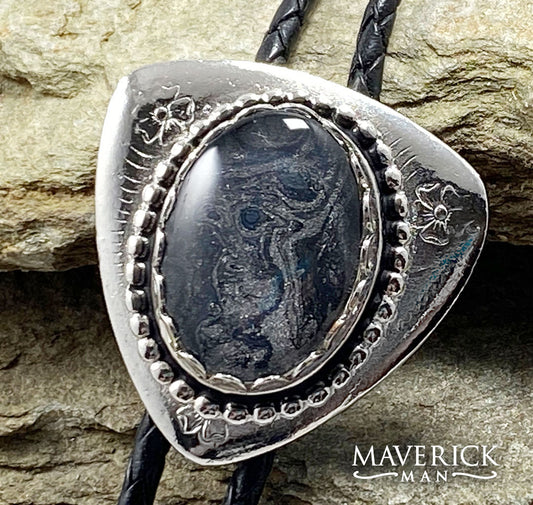 Unusual silver bolo with hand painted black and platinum stone